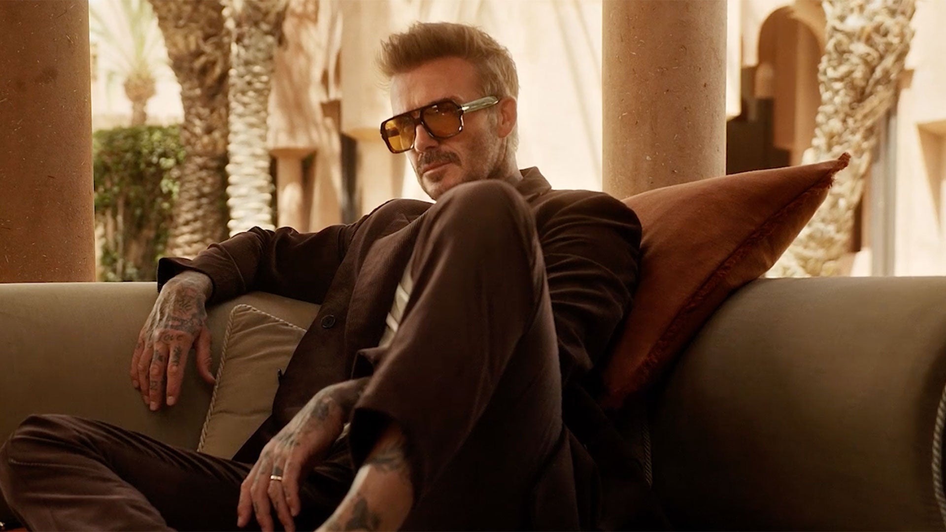 David Beckham wearing David Beckham Eyewear sunglasses - 50% off seasonal sale
