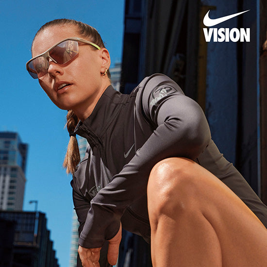 Nike women’s sunglasses with a beige frame and modern design